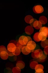 The multicolored side's or boke on a black background. Merry Christmas and happy New Year. Christmas background.