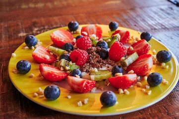 Various and colorful fruits as a healthy and vegan snack.