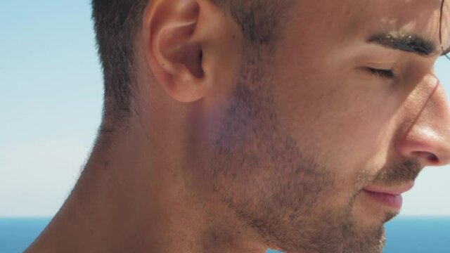 portrait of a handsome man in the pool, Close up