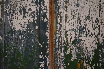 Background from old painted boards with peeling paint