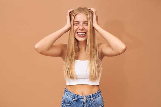 People, Lifestyle, Youth And Teen Age. Adorable Happy 18 Year Old European Girl With Facial Piercing And Teeth Braces Looking With Joyful Broad Smile, Being In Good Mood, Expressing Positive Emotions