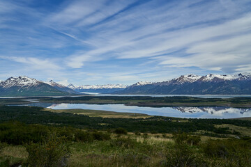 Perito Moreno glacier with dramatic clouds over the landscape of lago roca at glacier national park in Patagonia, Argentina in south America with snow covered mountains of the Andes
