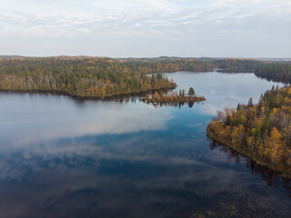A small island in the middle of the lake. Autumn in the Russian North
