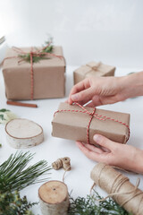 packaging of Christmas gifts with your own hands, small holiday paraphernalia