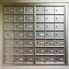 Metal locking mailboxes in an office building