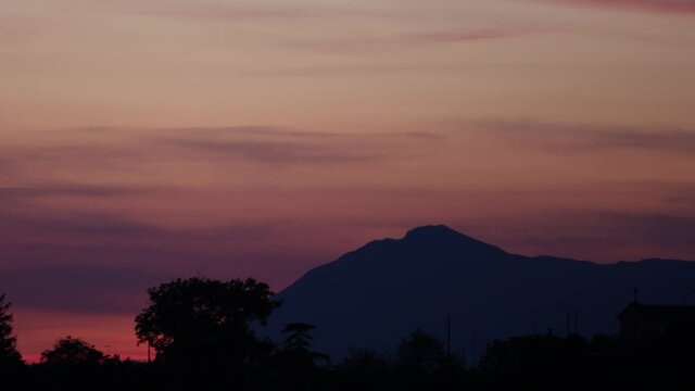 Timelapse 4K of sunset.Mount Taburno at sunset.