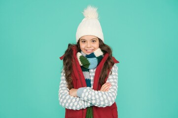 Holiday atmosphere. no hypothermia. cheerful girl wearing layers of clothing. warm cloth at wintertime season. cold weather forecast. kid fashion and shopping. xmas time. ready for new year vacation