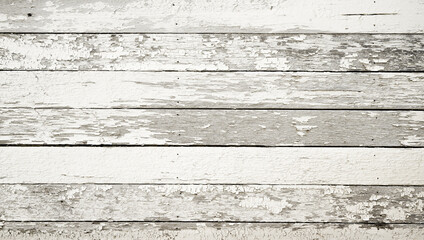 Vintage wood background with chipped peeling paint. Old horizontal board surface with old world feel.