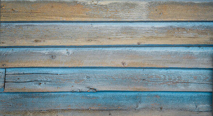 Vintage wood background with chipped peeling paint. Old horizontal board surface with old world feel.