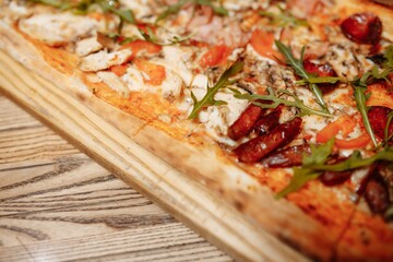 Pizza on wooden table top view. Fast food. Post blog social media. with copy space. Pizza ready to eat
