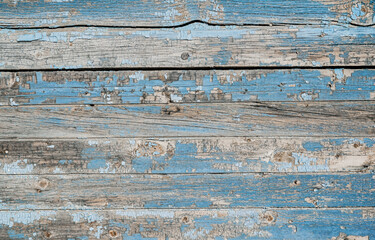 Vintage wood background with chipped peeling paint. Old horizontal board surface with old world feel.