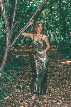 Pretty forest nymph closeup on the green natural background. Art photo