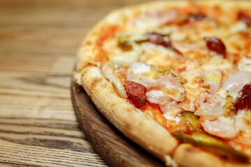 Pizza on wooden table top view. Fast food. Post blog social media. with copy space. Pizza ready to eat