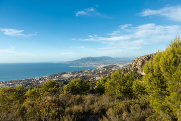 Fototapeta na wymiar Malaga city view from the top of the mountain - Malaga city view from San Anton mountain - Beautiful landscape in Costa del sol, Andalusia