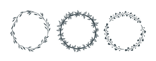 Obraz premium Hand drawn decorative floral round wreath frame