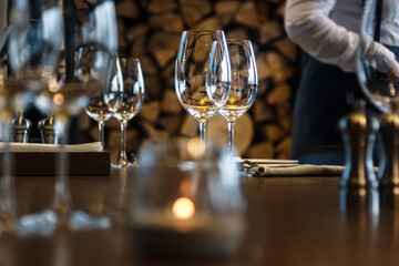 Clean empty glasses on the restaurant table waiting for guests