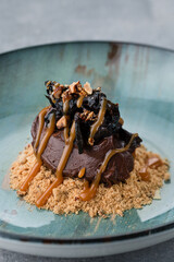 chocolate dessert with prunes and caramel