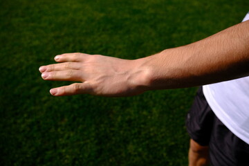 arm and hand veins prominent after sports. young mans hand and arm.