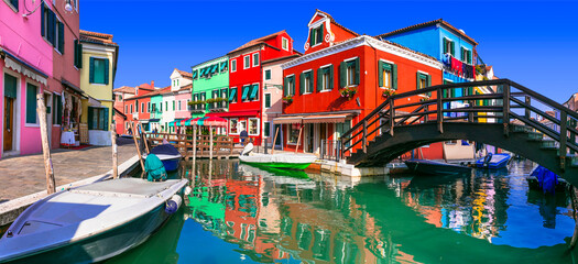 Fototapeta na wymiar Most colorful traditional fishing town (village) Burano - Island near of Venice. Italy travel and landmarks