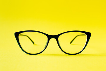 glasses for vision on a yellow background