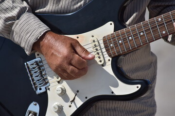 man playing guitar