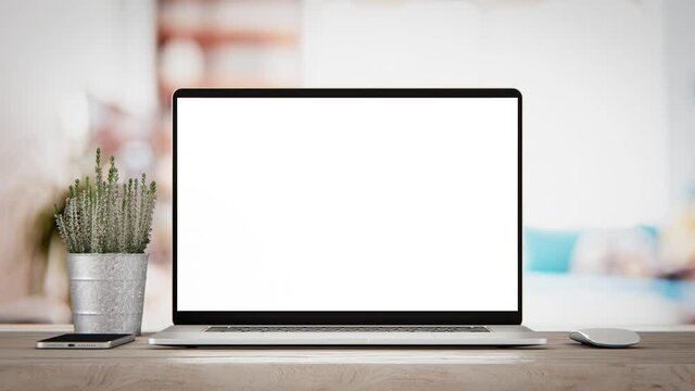 Laptop mockup with blank screen on white table, mouse and smartphone &ndash; home office, 4K UHD zoom-in shot