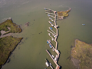 Traditional fishing boat bridge on a river in Portugal