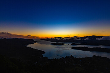 Sunrise at a fjord in New Zealand