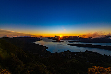 Sunrise at a fjord in New Zealand