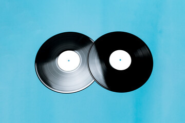musical record on a blue background flat lay