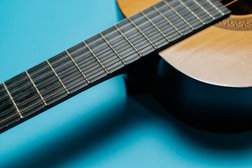 Obraz premium Guitar on a blue background