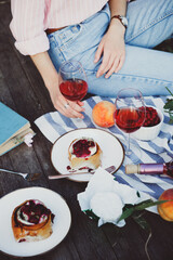 girl enjoying picnic on a wooden pie