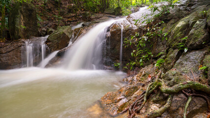 Small waterfall in the wild Long exposure image.