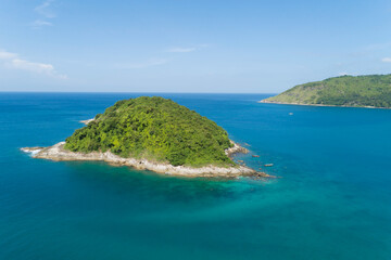 Drone aerial view shot of Tropical sea in sunny day with beautiful small island in the sea at Phuket island Thailand.