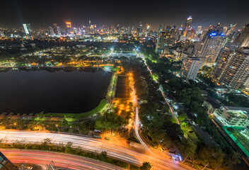 Fototapeta na wymiar Panoramic View of Bangkok, Thailand. Cityscape with Public Park and Skyscrapers at Night