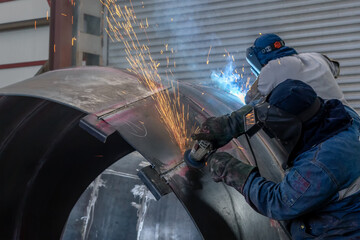 Welded manufacturing in the steel factory. Manufacturing engineering, or the manufacturing process,...