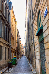 Narrow street of old town in Bordeaux . View of old traditional french street 