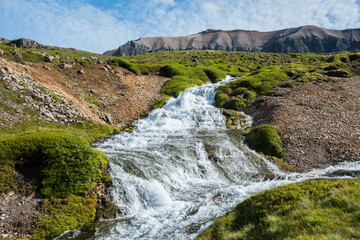 Cascade range in river in Breidavik in Iceland