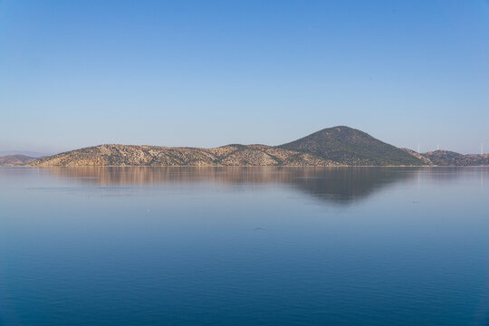 Mountains and lake panoramic view on a beautiful sunny day,