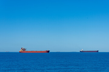 Four cargo ships anchorage on Coral Sea