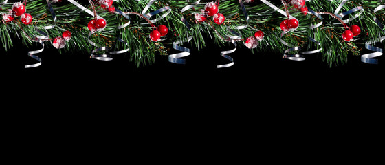 ..Seamless border with fir branches and tinsel. Christmas background.