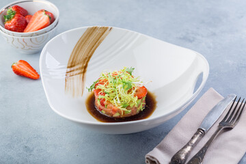 Ready made raw fish tartare from the chef. Original presentation.