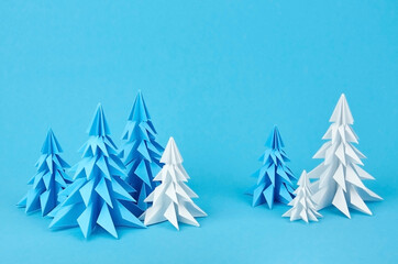 Blue and white paper origami christmas trees