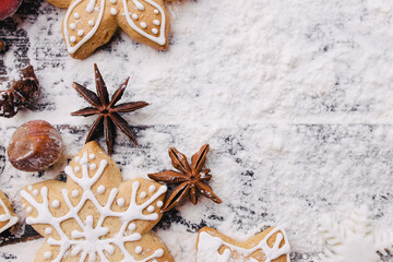 Christmas background, celebration, New Year's eve party concept. Beautiful embellishments, homemade gingerbread cookies and food decorations, template with copy space