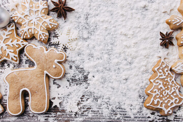 Christmas background, celebration, New Year's eve party concept. Beautiful embellishments, homemade gingerbread cookies and food decorations, template with copy space