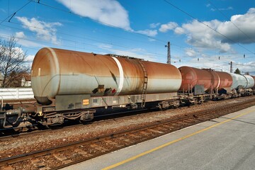 Fototapeta na wymiar Freight train silo wagons on railway