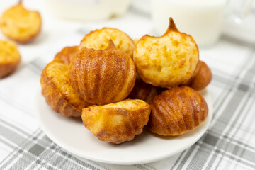 Brazilian snack cheese bread or pao de queijo in pumpkin shape