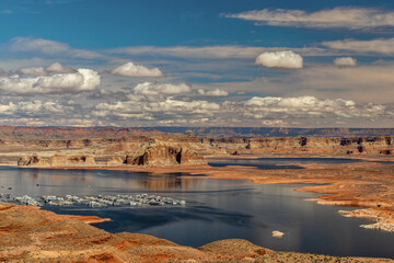 The sun lights up the rolling hills, the river and the marina, Wahweap lookout, Page, AZ