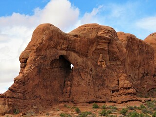 Peep hole in the red sandstone at Arches National Park