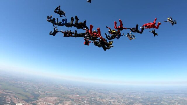 Skydiving large group formation clear sky take off